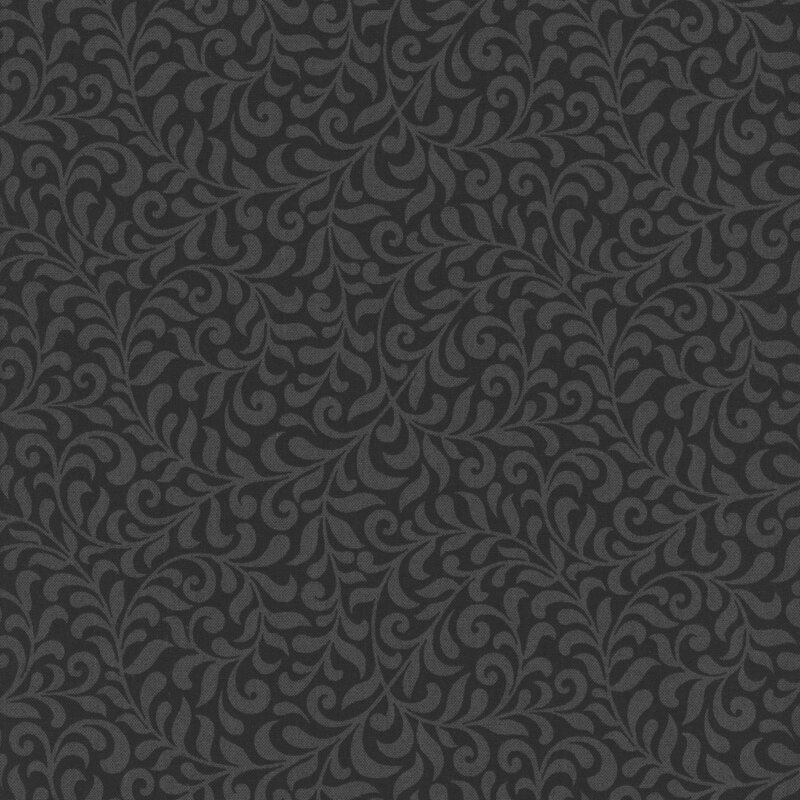 fabric featuring dark grey swirls on a black background