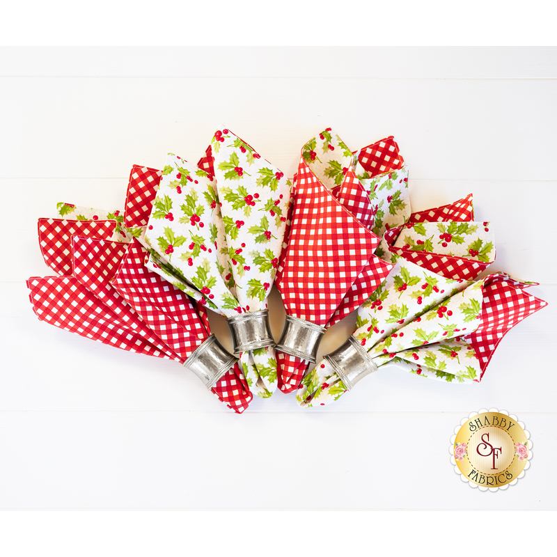 Cloth Napkins with holly on one side and red and white gingham on the other