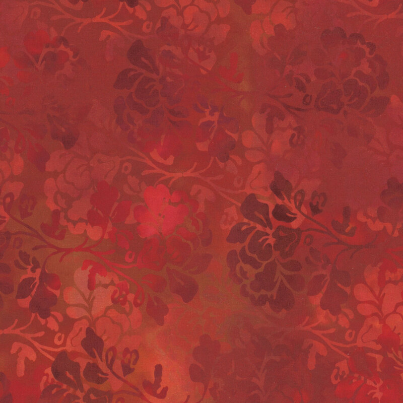 rust orange and red variegated shades with floral silhouettes all over