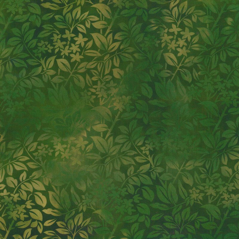 Variegated green fabric with overlapping tonal leaves all over