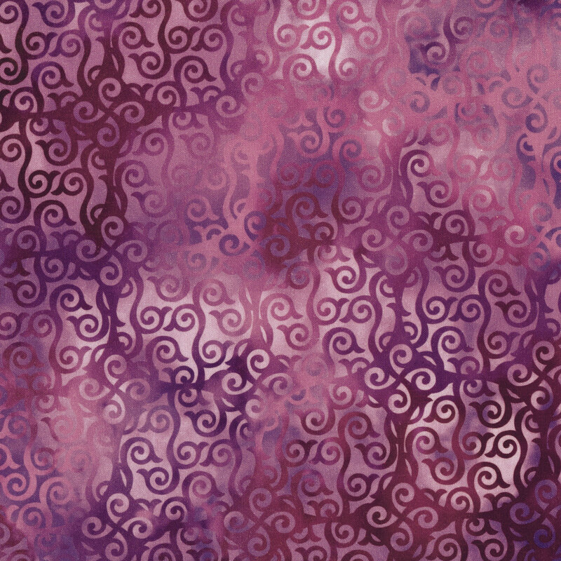 Variegated purple fabric with large circles and swirls all over