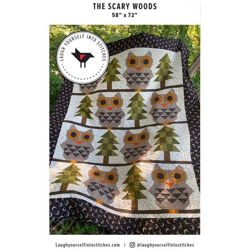 front pattern booklet featuring finished quilt with owls and pine trees all over