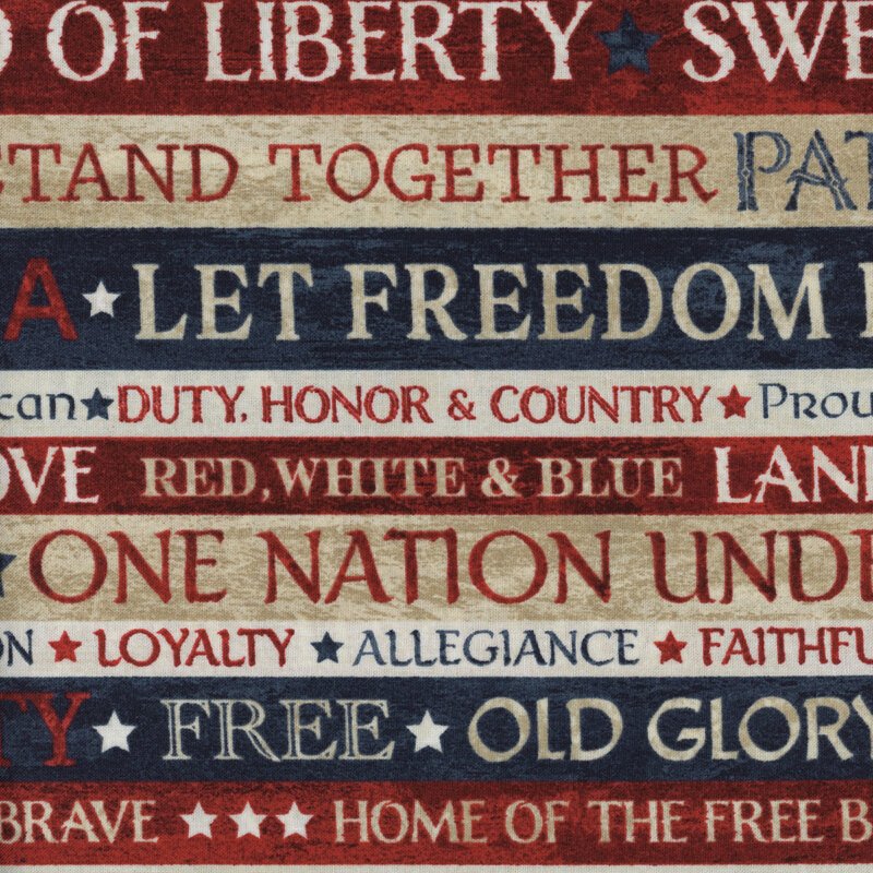 A patriotic striped fabric with red, white, and blue stripes and patriotic sayings