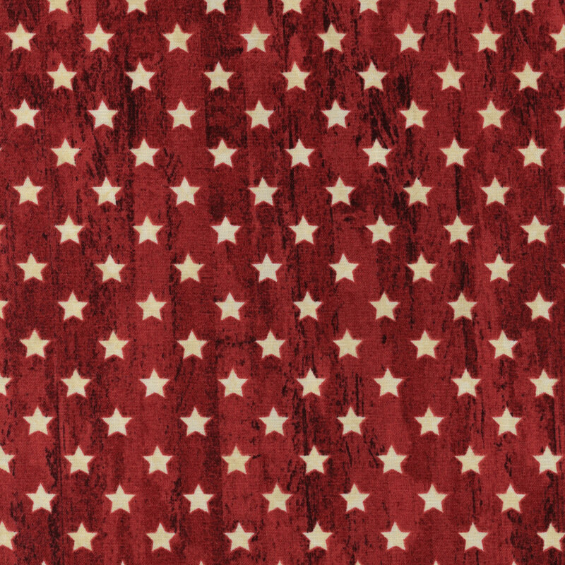A red fabric with wood textured background and small white stars all over
