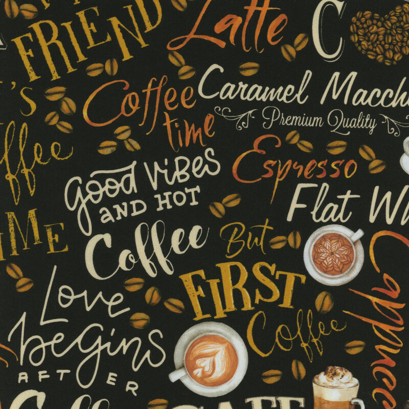A black fabric with fun coffee phrases, coffee cups, and scattered coffee beans all over