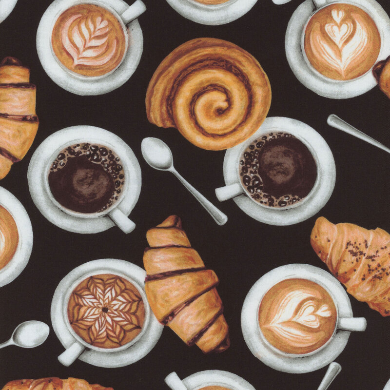 Fabric with top down cups of coffee, spoons, and croissants scattered on a solid black background