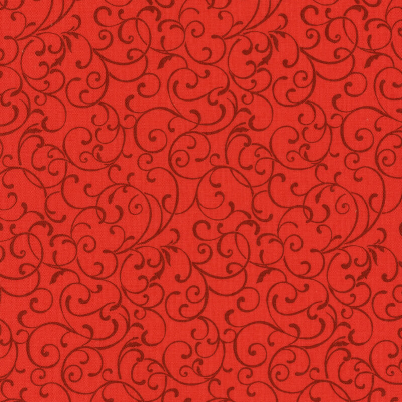 Bright red fabric with dark red swirls and scrolls all over