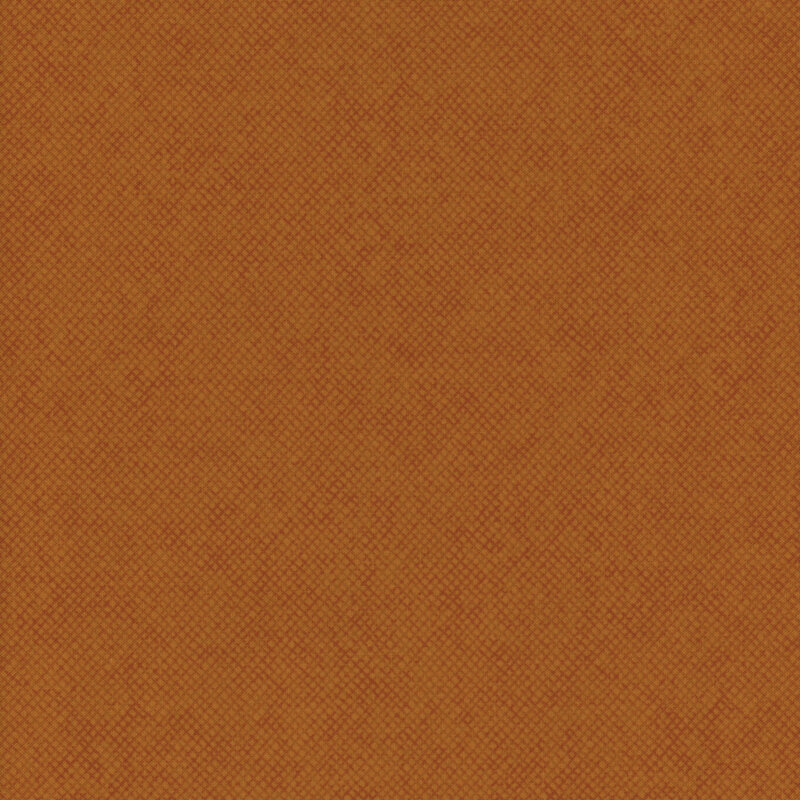 A pumpkin orange fabric with a tonal textured crosshatch design