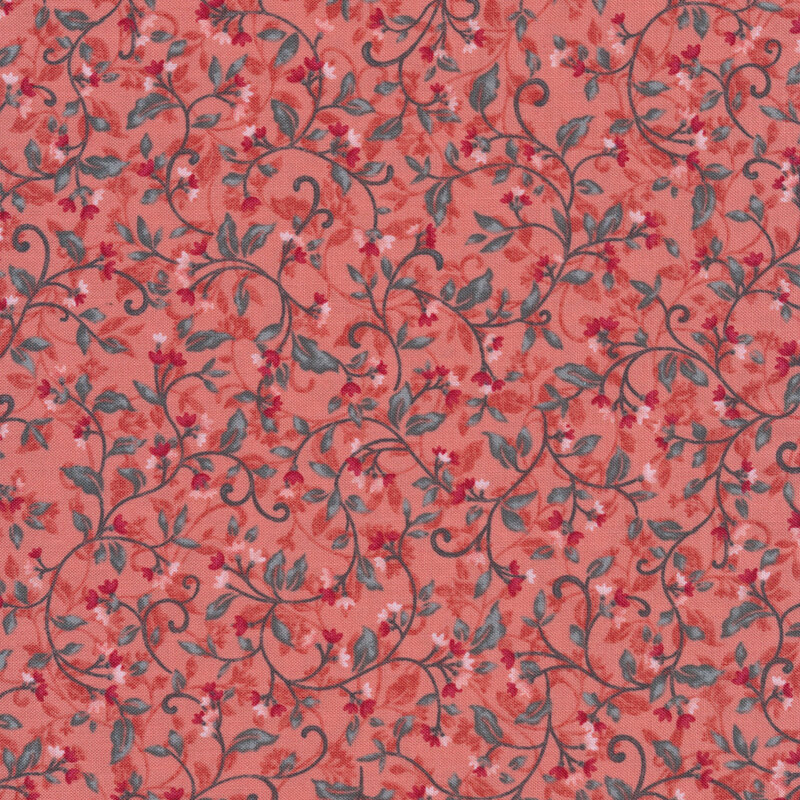 Pink fabric with small gray leaves and vines with small pink and red flowers
