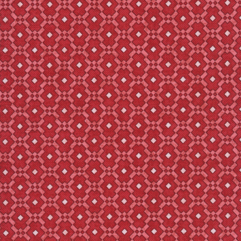 Red fabric with a geometric tiled pattern and small white squares