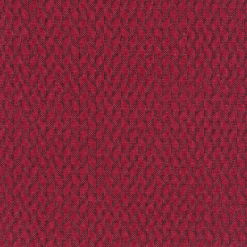 Red fabric with dark red leaves and vines