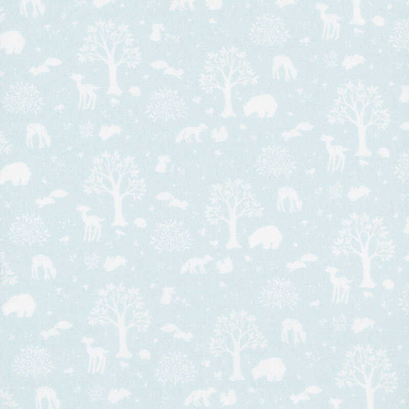 pale blue fabric with white silhouettes of trees and forest animals