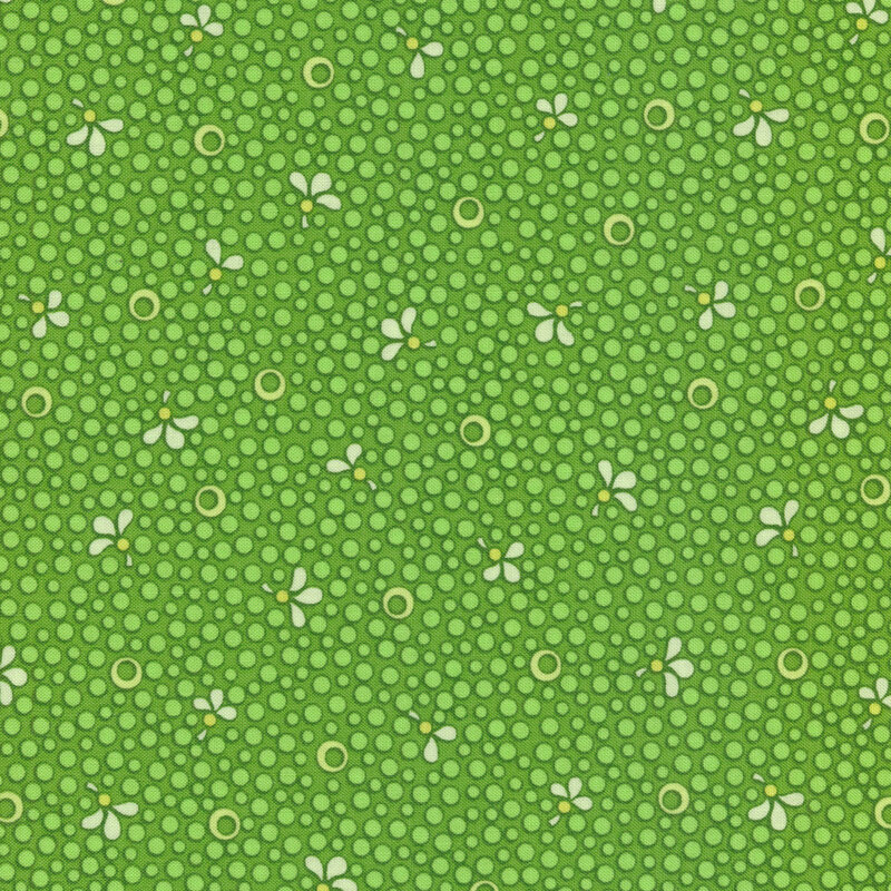 Green Christmas fabric with light green spots and small cream leaves