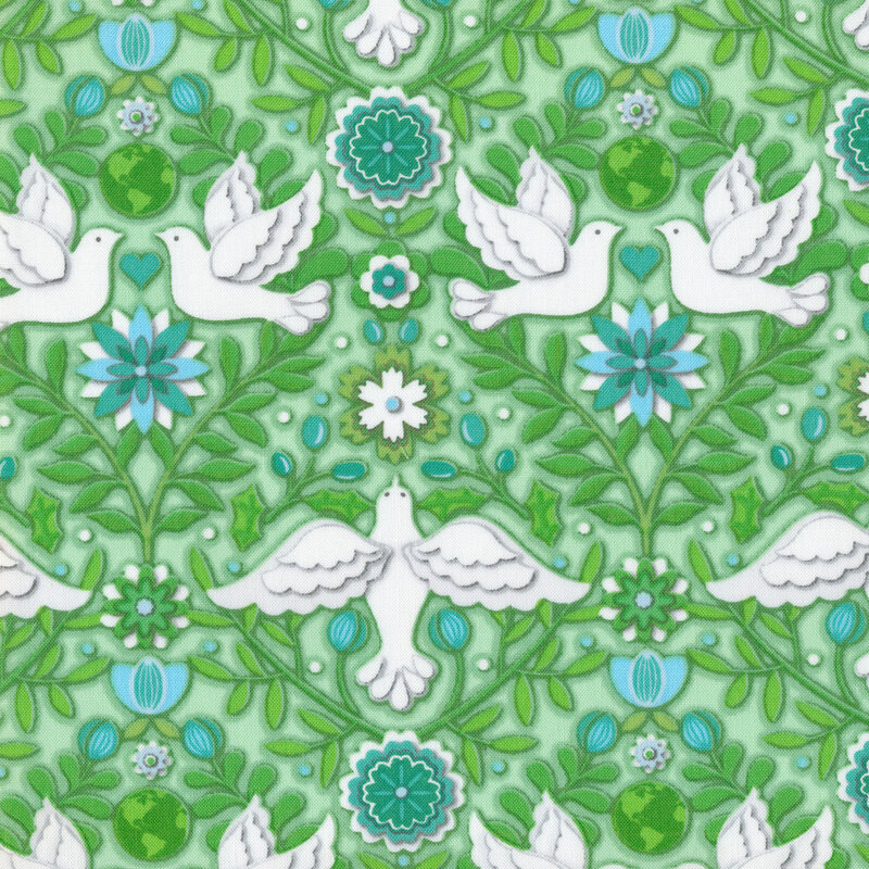Green fabric with white doves in a damask pattern surrounded by green and blue leaves and flowers