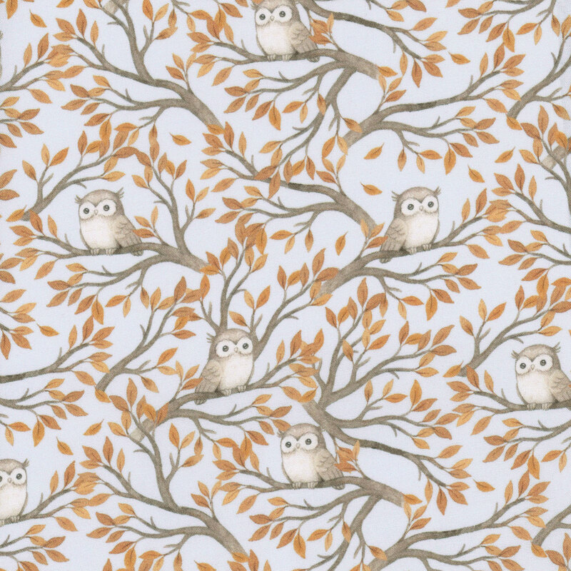 pale blue fabric with criss crossing branches with autumn leaves and small brown owls