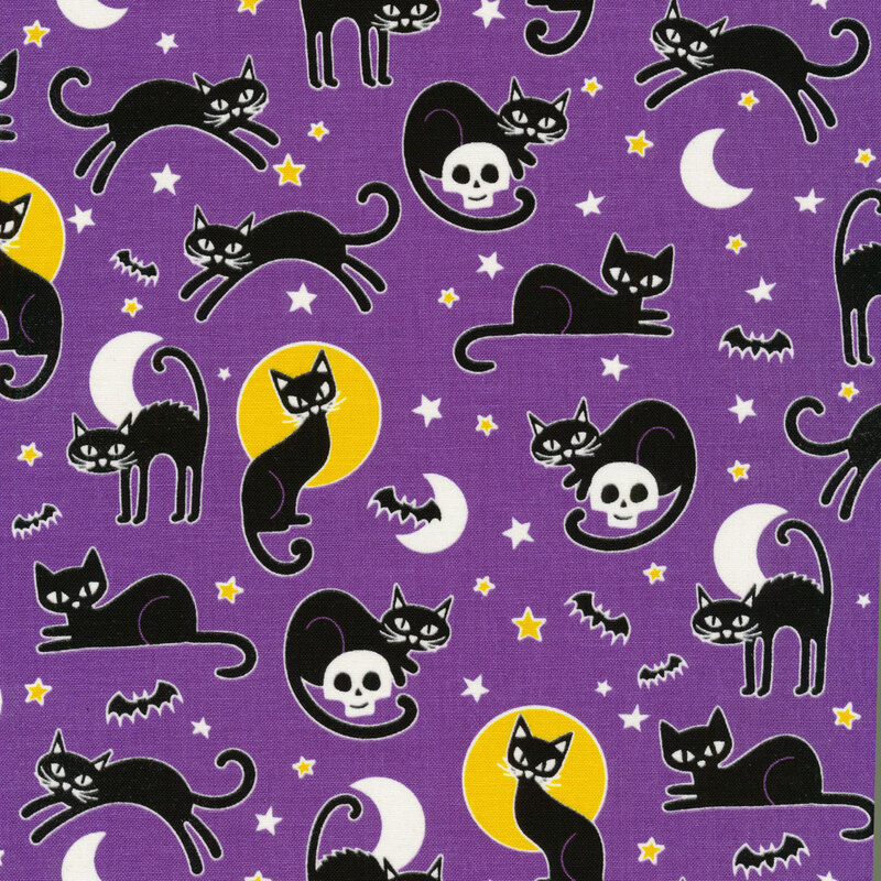 scan of fabric with black cats with small bats, stars, and moons on a purple background