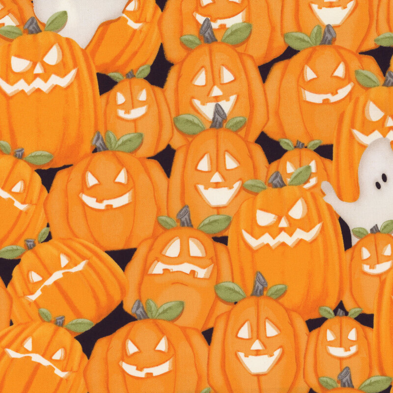 Fabric with packed jack-o-lanterns and ghosts on a black background