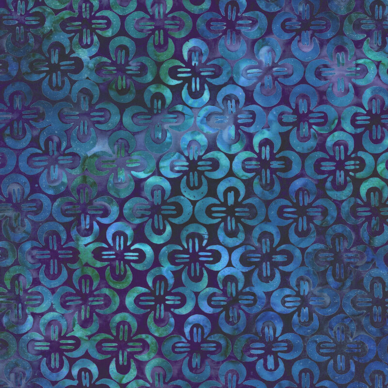 blue and aqua repeating pattern on a dark blue background