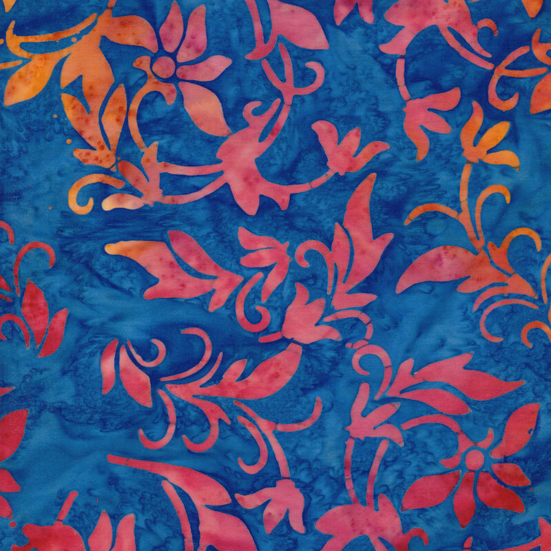 Blue mottled fabric with pink and orange mottled flowering vines
