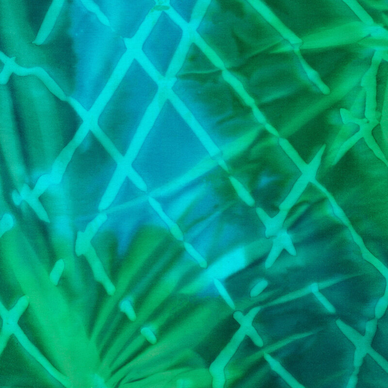 Teal and green mottled fabric with light, tonal lines overlapping at random