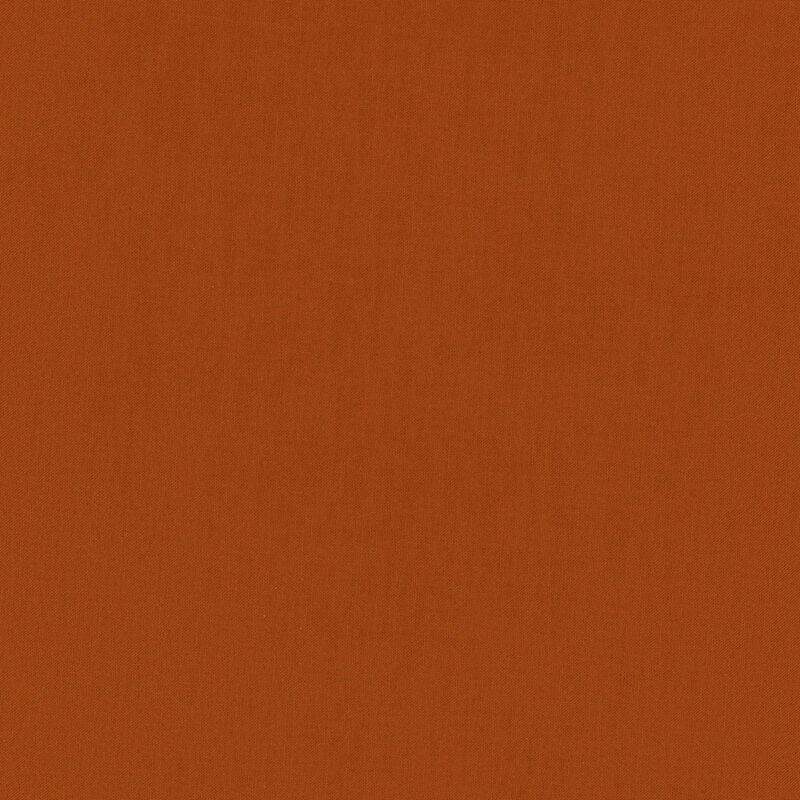 solid burnt orange colored fabric