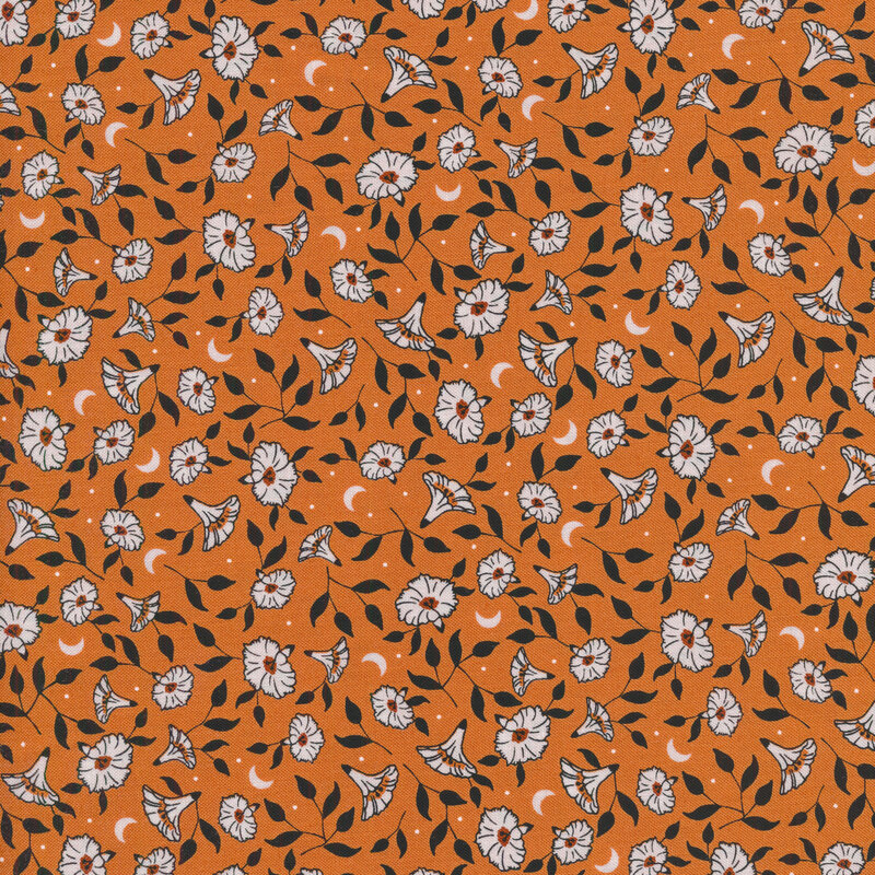 Orange fabric with tossed white pumpkin flowers with black leaves and tiny white crescent moons between them