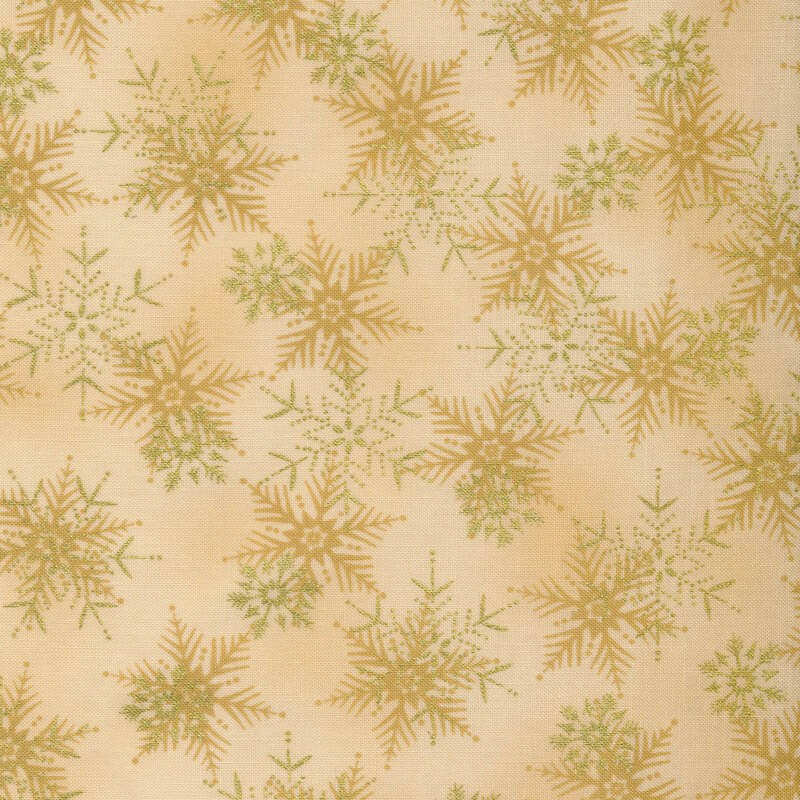 Mottled beige fabric with gold metallic snowflakes all over