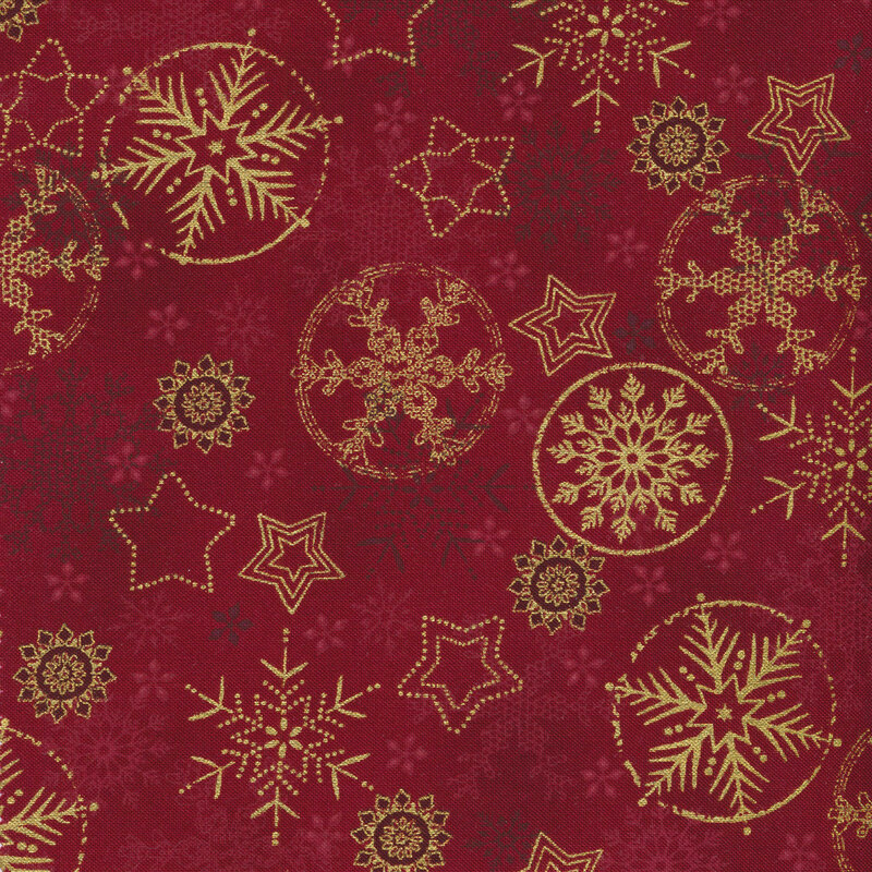Bright red fabric with gold metallic snowflakes and stars