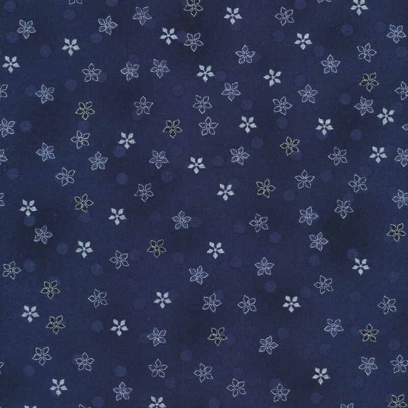 Navy blue mottled fabric with light blue polka dots and silver metallic poinsettia flowers all over