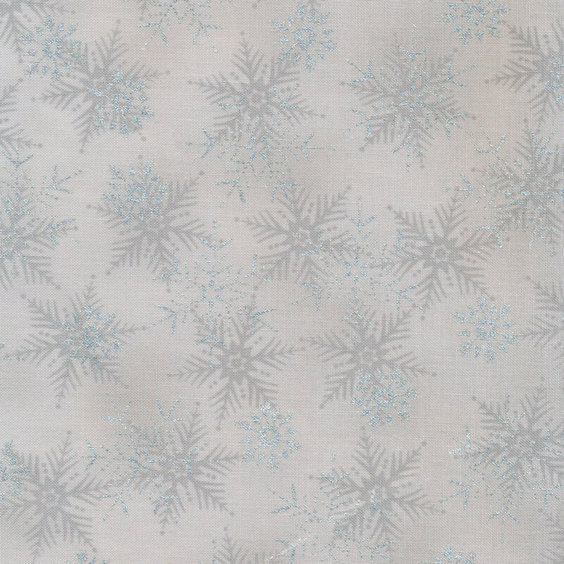 Gray fabric with light gray and silver metallic snowflakes all over
