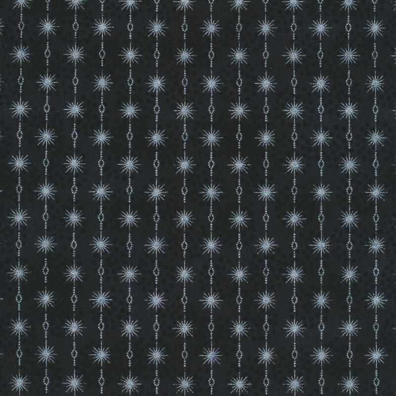 Black and charcoal mottled fabric with stripes of silver metallic stars connected by chains