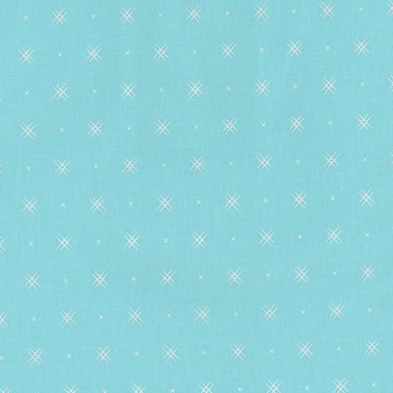 Aqua blue fabric with rows of small white x's and double criss-cross patterns