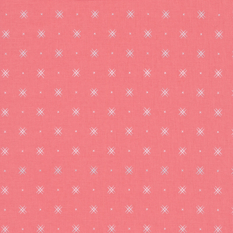 Tea Rose Pink fabric with rows of small white x's and double criss-cross patterns