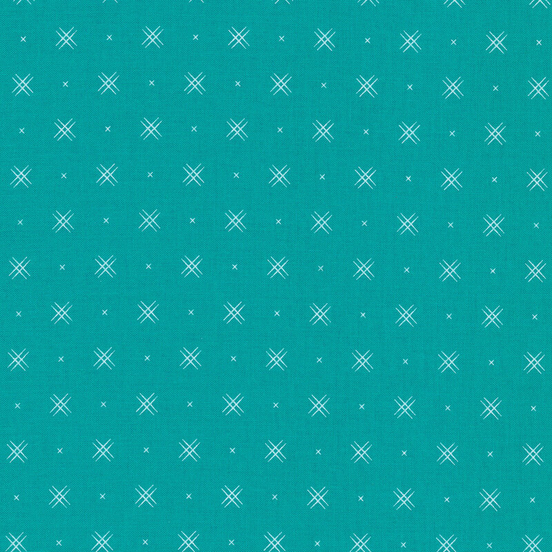 Turquoise fabric with rows of small white x's and double criss-cross patterns