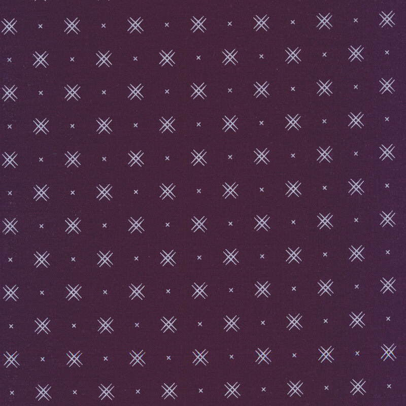 Prune Purple fabric with rows of small white x's and double criss-cross patterns