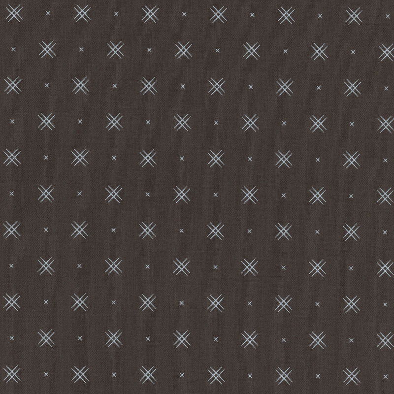 Charcoal fabric with rows of small white x's and double criss-cross patterns