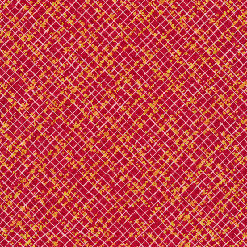 Raspberry red fabric with a light pink lattice pattern and tiny dark orange flowers all over