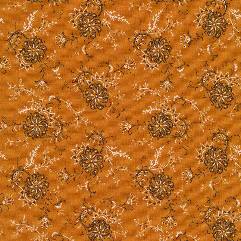black and white abstract paisley design on an amber background