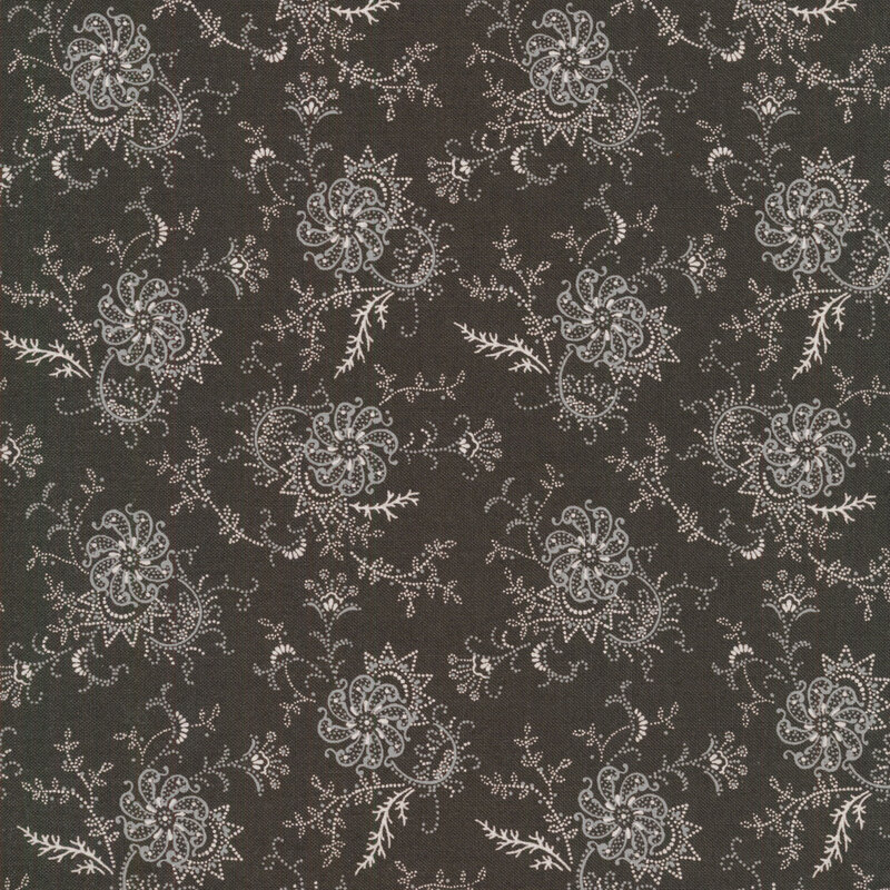gray and white abstract paisley pattern on a dark gray background