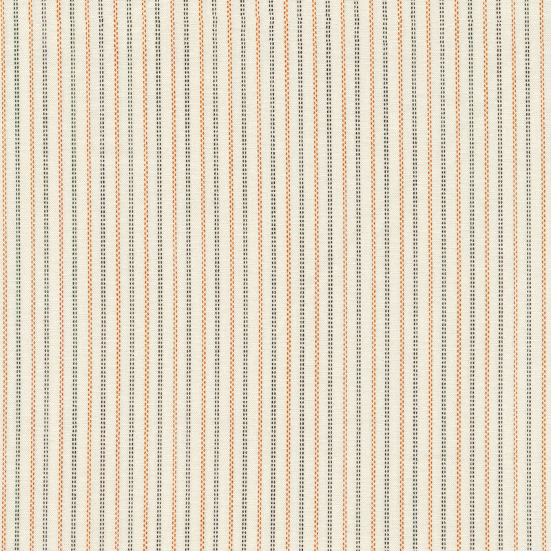 cream fabric with orange and black pin stripes