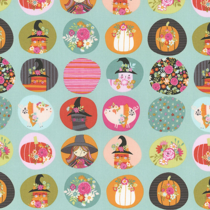 Teal fabric with circular badges each with a colorful illustration