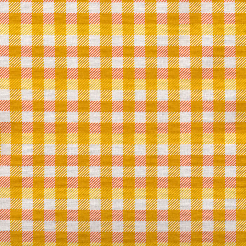 Yellow, orange, and white plaid fabric