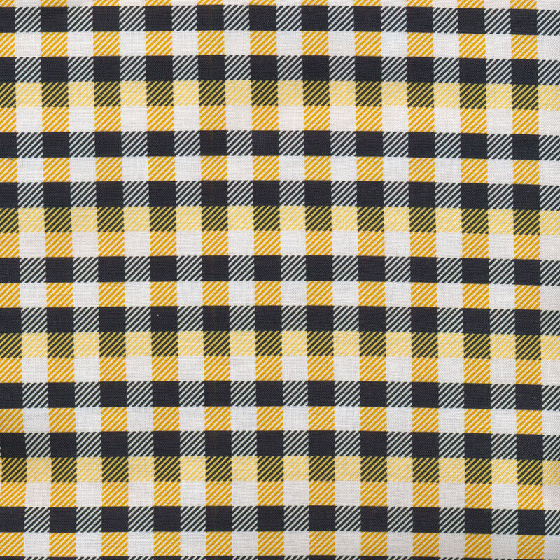 Yellow, black, and white plaid fabric