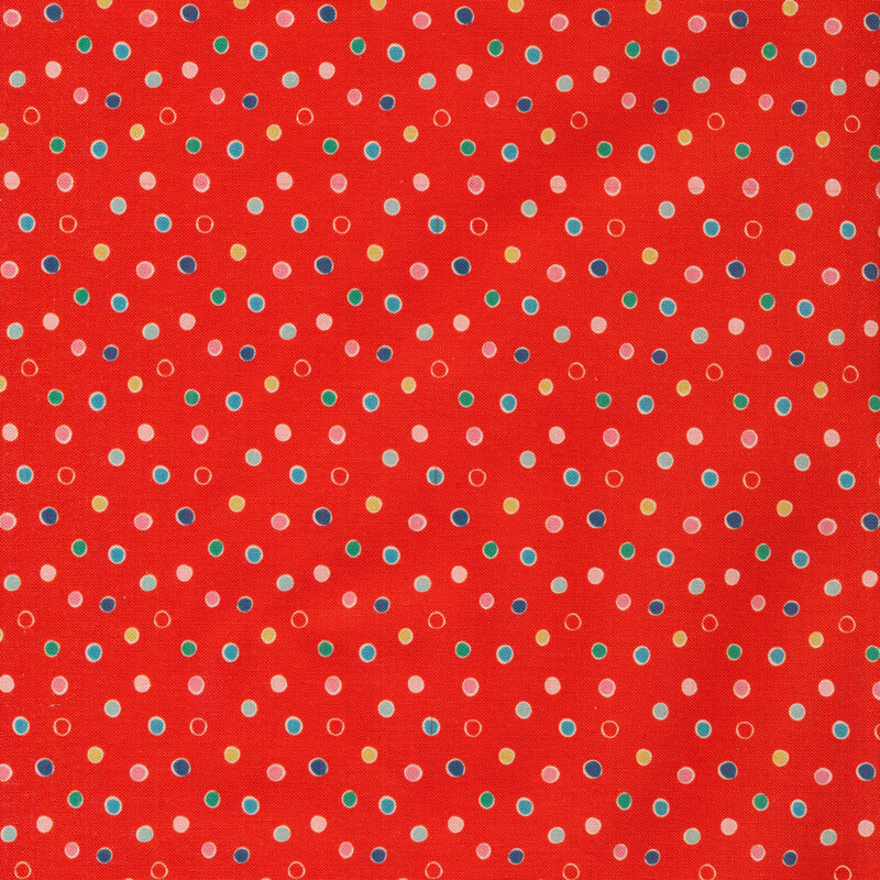 Bright red fabric with multi-colored polka dots all over