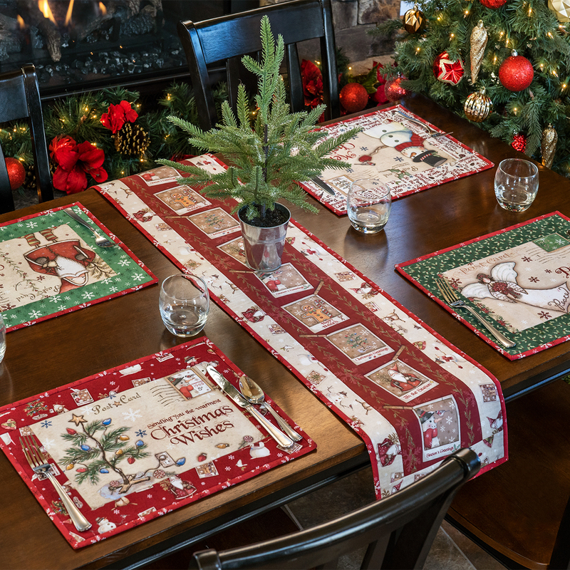 Christmas-themed dining table with festive placemats, a small plant centerpiece, and holiday decorations.