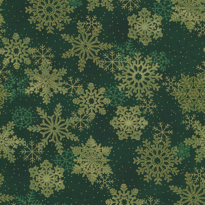 Dark green mottled fabric with large gold metallic snowflakes all over