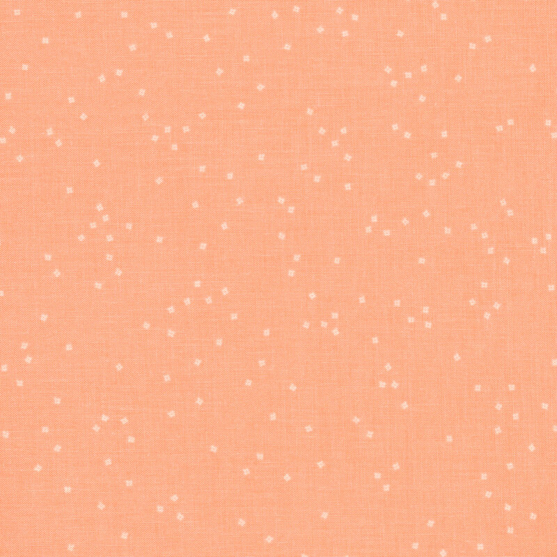 Small white flower blossoms scattered on a peach background