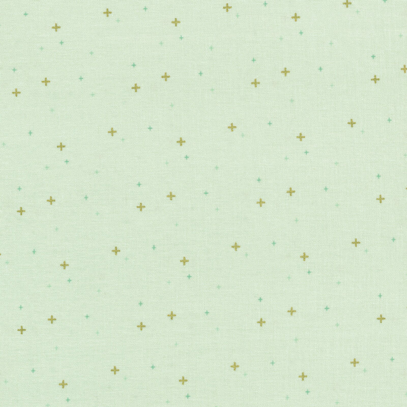 Pale aqua fabric with gold and blue plus signs/crossed lines scattered all over.