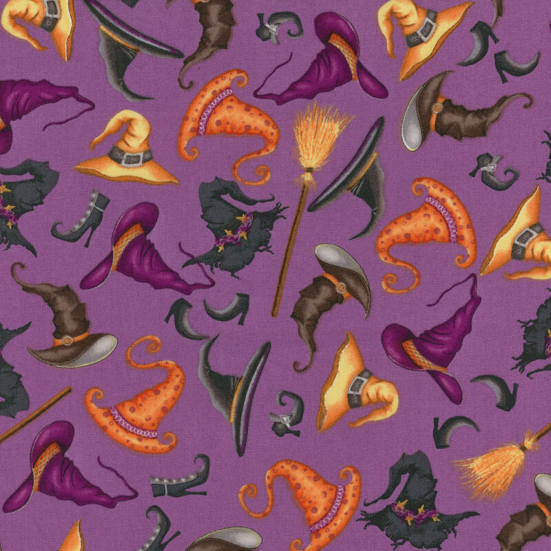 Purple fabric with multicolored tossed witch hats, shoes, and brooms