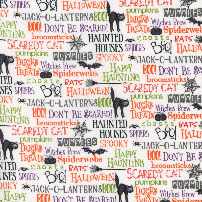 White fabric with multicolored words, phrases, and halloween motifs all over